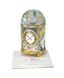 Patek Philippe. A very fine and attractive unique gilt brass solar-powered table clock with cloisonne enamel by L. Rhee and certificate