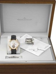 Jaeger-LeCoultre. A fine, rare and large 18K pink gold automatic dual time zone one minute tourbillon wristwatch with date, original guarantee and box