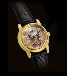 GIRARD-PERREGAUX. A FINE AND RARE 18K GOLD TOURBILLON WRISTWATCH WITH THREE GOLD BRIDGES