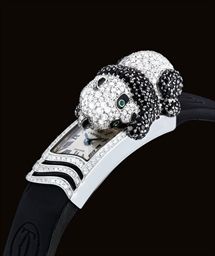 CARTIER. A LADY ’ S CHARMING AND FINE 18K WHITE GOLD, DIAMOND, BLACK SAPPHIRE AND EMERALD-SET RECTANGULAR WRISTWATCH WITH CONCEALED DIAL