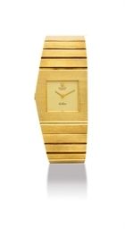 ROLEX. AN UNUSAL 18K GOLD ASYMMETRIC LEFT HANDED BRACELET WATCH