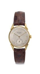 Patek Philippe. A Fine 18k Gold Wristwatch with Two-Tone Dial and Fancy Lugs