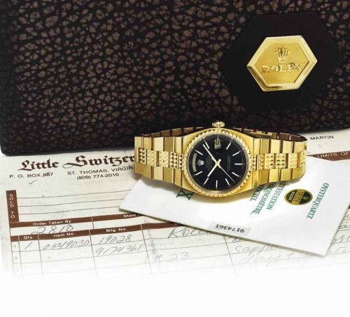 ROLEX. A RARE AND IMPRESSIVE 18K GOLD WRISTWATCH WITH SWEEP CENTRE SECONDS, DAY, DATE, BLACK DIAL, BRACELET, ORIGINAL GUARANTEE AND BOX