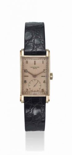 PATEK PHILIPPE. AN 18K PINK GOLD RECTANGULAR WRISTWATCH WITH SILVERY ROSE DIAL