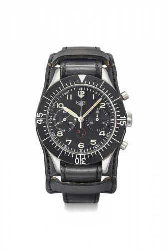 Heuer. A rare and large military stainless steel flyback chronograph wristwatch with engraved case back