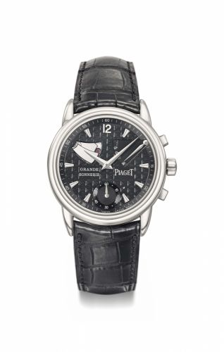Piaget. An extremely fine and possibly unique 18K white gold two train minute repeating and grande and petite sonnerie striking wristwatch with power reserve, visible hammers, black dial and wooden box