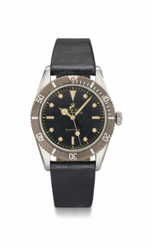 Rolex. A fine and very rare stainless steel automatic wristwatch with sweep centre seconds and tropical bezel