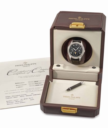 Patek Philippe. A fine and rare 18K white gold limited series automatic perpetual calendar wristwatch with moon phase, certificate of origin and winding box