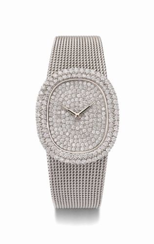 Patek Philippe. A very fine, rare and impressive 18K white gold and diamond-set oval wristwatch with 18K white gold bracelet