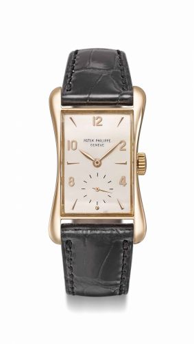 Patek Philippe. A fine and rare 18K pink gold rectangular wristwatch with flared sides