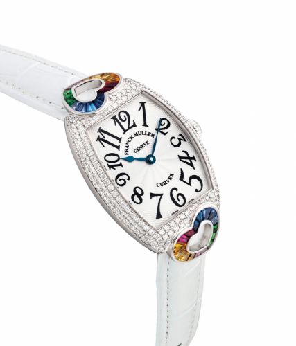 FRANCK MULLER. AN UNUSUAL 18K WHITE GOLD AND GEM-SET TONNEAU-SHAPED WRISTWATCH