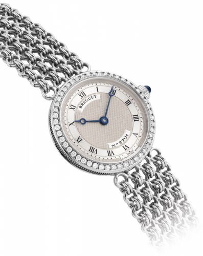 BREGUET. A LADY/bb’/bbS FINE AND ELEGANT 18K WHITE GOLD AND DIAMOND-SET BRACELET WATCH/b