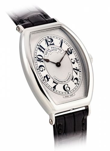 PATEK PHILIPPE. A FINE PLATINUM TONNEAU-SHAPED WRISTWATCH