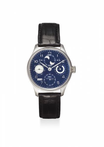 IWC. A FINE AND LARGE 18K WHITE GOLD AUTOMATIC PERPETUAL CALENDAR WRISTWATCH WITH 7-DAYS POWER RESERVE, DIGITAL YEAR DISPLAY AND MOON PHASES WITH ORIGINAL WARRANTY, REPLACEMENT CALENDAR AND BOX