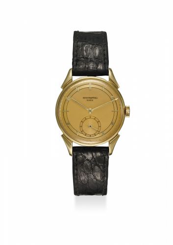 PATEK PHILIPPE. A FINE, RARE AND ATTRACTIVE 18K GOLD WRISTWATCH WITH TWO-TONE DIAL AND FANCY LUGS AND EXTRACT FROM THE ARCHIVE