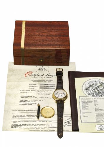 PATEK PHILIPPE. A VERY FINE AND RARE 18K YELLOW GOLD AUTOMATIC MINUTE REPEATING PERPETUAL CALENDAR WRISTWATCH WITH MOON PHASES, ORIGINAL CERTIFICATE, SECOND CASE BACK AND BOX/bb