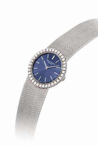 PATEK PHILIPPE. A LADY'S FINE 18K WHITE GOLD AND DIAMOND-SET BRACELET WATCH
