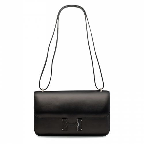 A BLACK CALF BOX LEATHER CONSTANCE ÉLAN WITH BLACK LIZARD CLASP