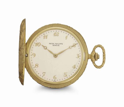 Patek Philippe. A Unique and Finely Engraved 18k Gold Hunter Case Pocket watch with Breguet Numerals