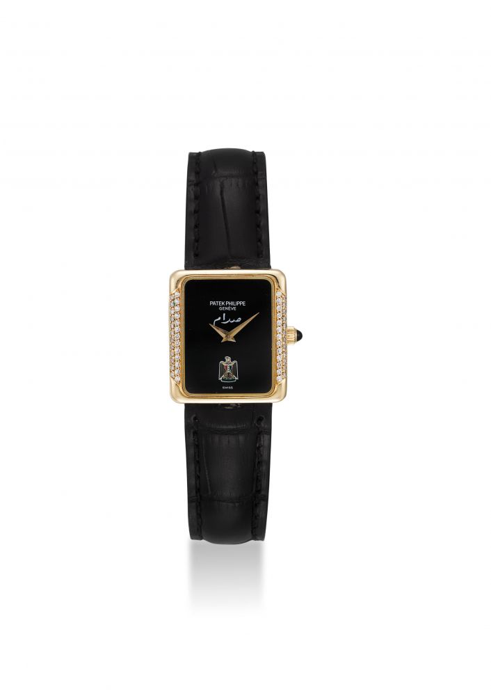 PATEK PHILIPPE. A VERY FINE AND RARE YELLOW GOLD DIAMOND-SET WRISTWATCH WITH AN ONYX DIAL AND IRAQI COAT OF ARM, BOX