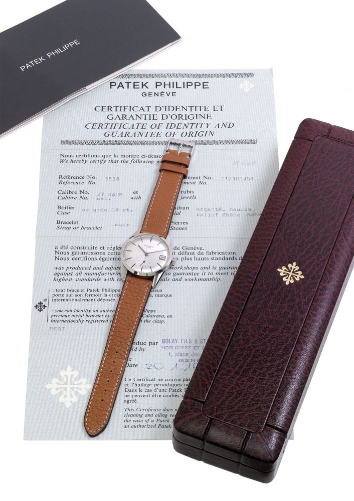 PATEK PHILIPPE. A FINE AND ATTRACTIVE, 18K WHITE GOLD, AUTOMATIC, WRISTWATCH WITH DATE AND BOX