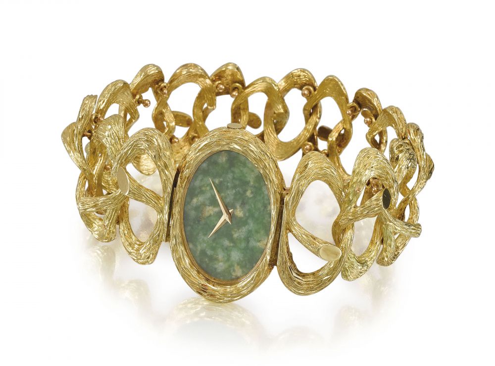 PIAGET. A VERY FINE AND ELEGANT LADY’S 18K GOLD BRACELET WATCH WITH JADE DIAL