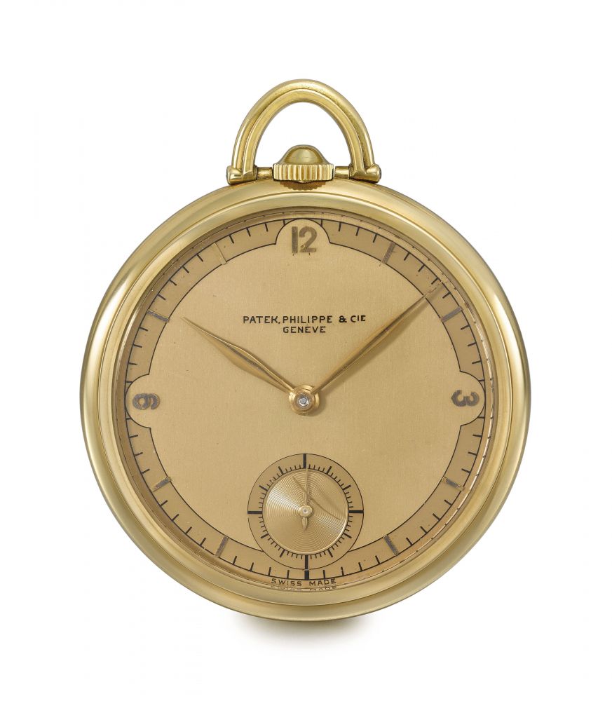 Patek Philippe. A fine and attractive 18K gold openface keyless lever watch with two-tone gilt dial