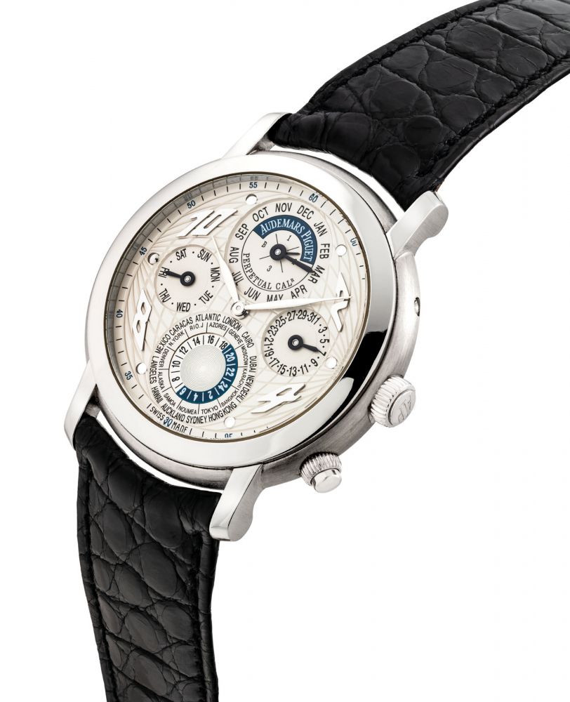 AUDEMARS PIGUET. A FINE AND RARE PLATINUM AUTOMATIC PERPETUAL CALENDAR WORLD TIME WRISTWATCH WITH LEAP YEAR INDICATION