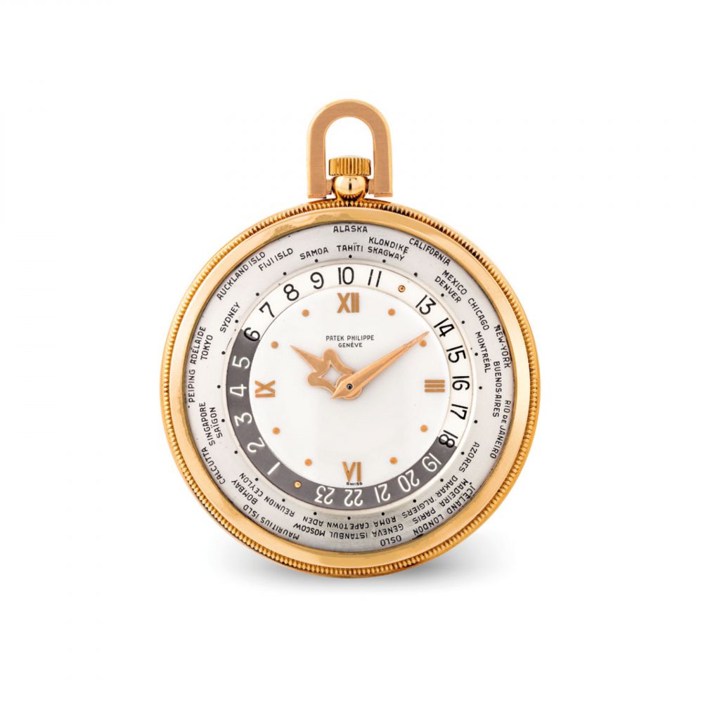 PATEK PHILIPPE. A FINE AND VERY RARE 18K PINK OPENFACE GOLD WORLD TIME KEYLESS LEVER WATCH