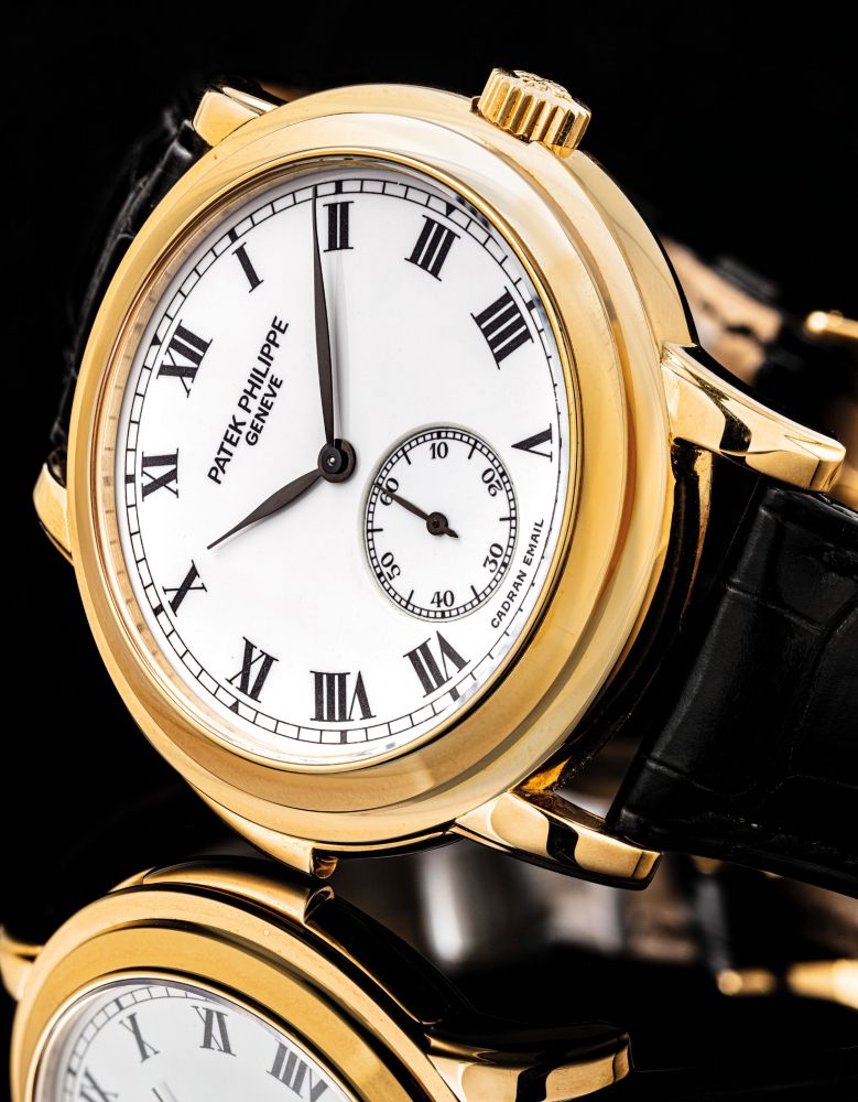 PATEK PHILIPPE. A VERY FINE, RARE AND LARGE 18K GOLD AUTOMATIC CATHEDRAL MINUTE REPEATING WRISTWATCH WITH ENAMEL DIAL