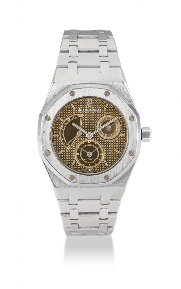 AUDEMARS PIGUET. A FINE STAINLESS STEEL AUTOMATIC DUAL TIME WRISTWATCH WITH DATE, POWER RESERVE, BRACELET AND TROPICAL DIAL