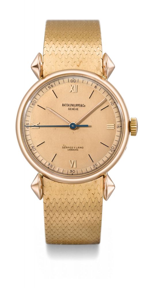 Patek Philippe. A very rare and highly attractive 18K pink gold wristwatch with indirect sweep centre seconds, two-tone pink dial, unusual lugs and bracelet