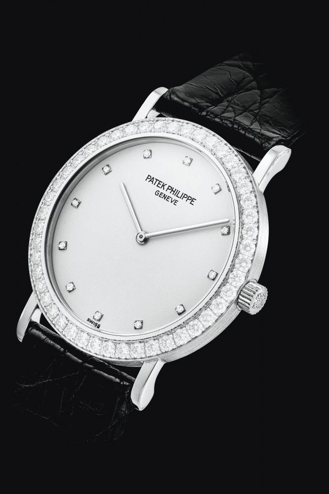 PATEK PHILIPPE. AN 18K WHITE GOLD AND DIAMOND-SET WRISTWATCH