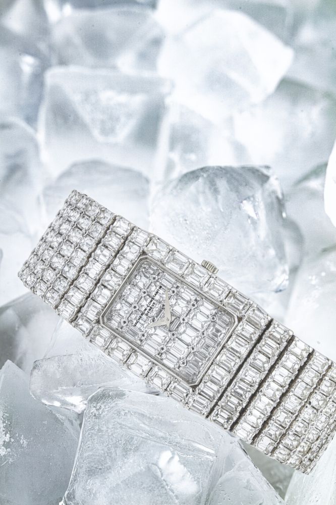 VACHERON CONSTANTIN. A SPECTACULAR AND MAGNIFICENT 18K WHITE GOLD AND DIAMOND-SET RECTANGULAR BRACELET WATCH