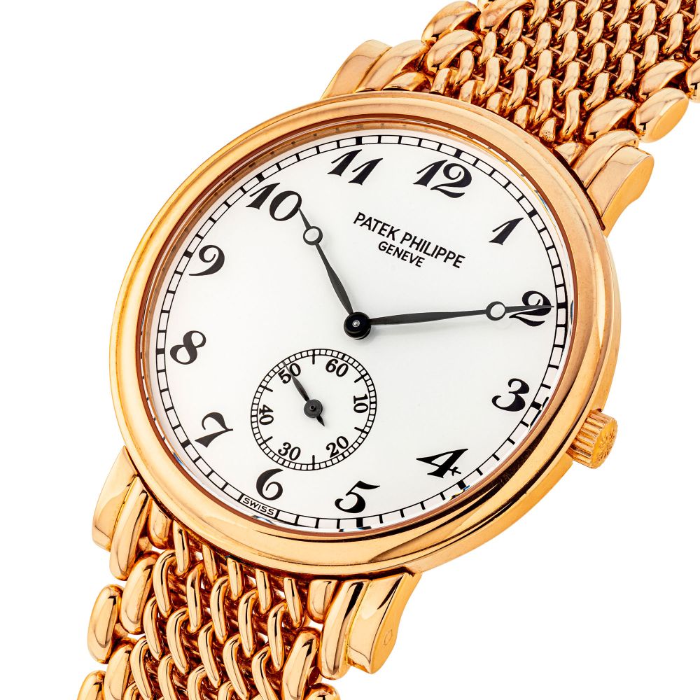 PATEK PHILIPPE, PINK GOLD WITH BREGUET NUMERALS, REF. 5022/1 -