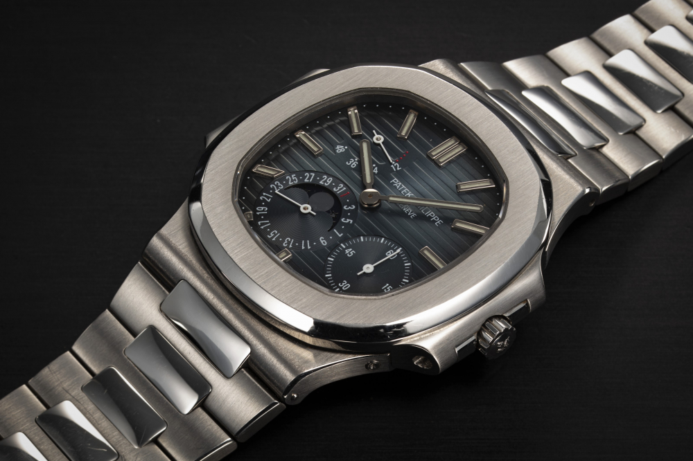 PATEK PHILIPPE, NAUTILUS REF. 3712/1A-001, A STEEL AUTOMATIC WRISTWATCH WITH DATE, MOON-PHASE, AND POWER RESERVE (4 DOT, SECOND SERIES) - CASE