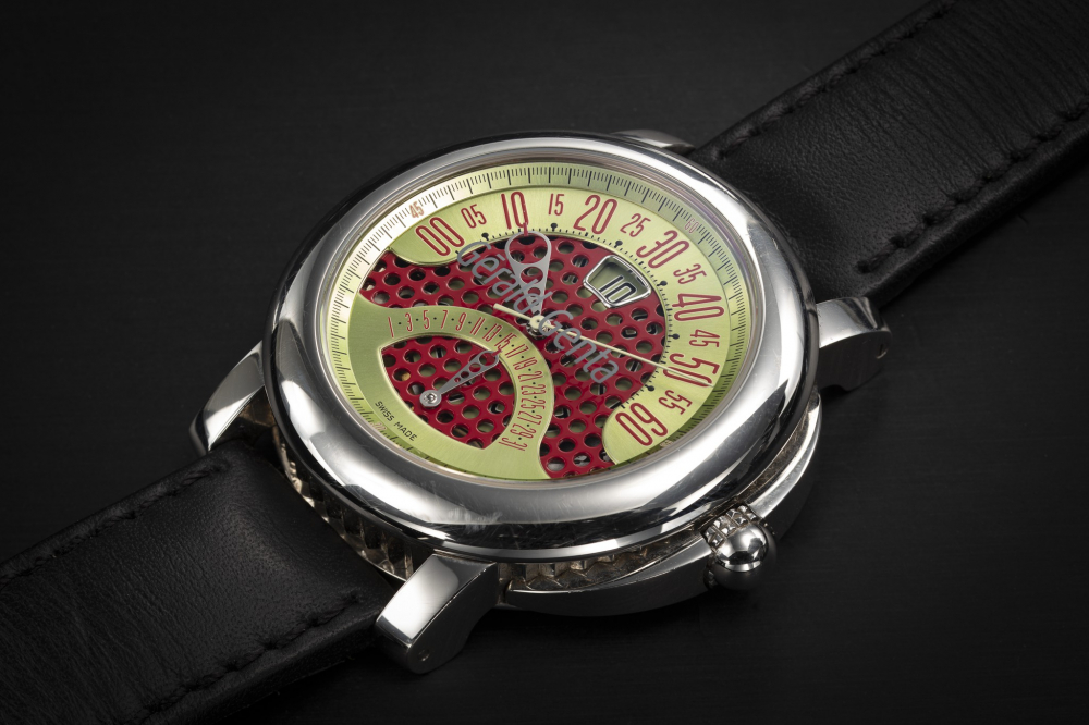 GERALD GENTA, ARENA BIRETRO REF. BSP.Y.10, A STEEL AUTOMATIC WRISTWATCH WITH RETROGRADE MINUTES AND DATE - CASE
