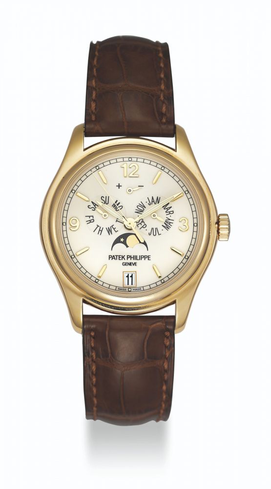 PATEK PHILIPPE, GOLD ANNUAL CALENDAR WITH MOON PHASES, REF. 5146J - MOVEMENT NO. 3'421'567, CASE NO. 4'319'540