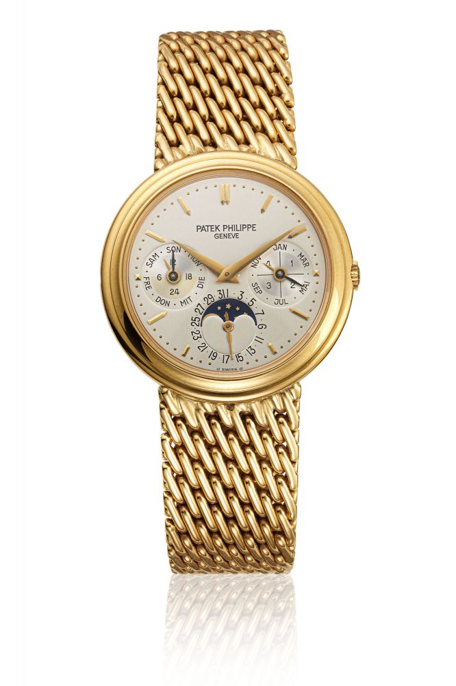 PATEK PHILIPPE, GOLD PERPETUAL CALENDAR WRISTWATCH WITH BRACELET, REF. 3945/1 - MOVEMENT NO. 3'124'349, CASE NO. 2'958'413