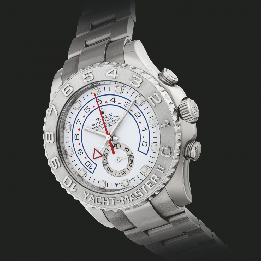 ROLEX. AN 18K WHITE GOLD AUTOMATIC REGATTA CHRONOGRAPH WRISTWATCH WITH COUNTDOWN INDICATION AND BRACELET