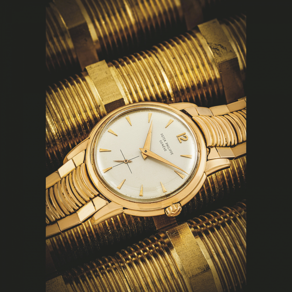 PATEK PHILIPPE. AN 18K PINK GOLD AUTOMATIC WRISTWATCH WITH BRACELET