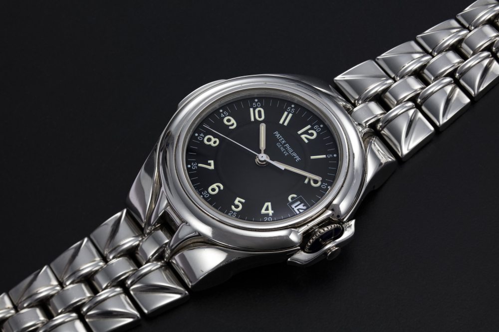 PATEK PHILIPPE, REF. 5091/1, A STEEL WRISTWATCH WITH INTEGRATED BRACELET - CASE