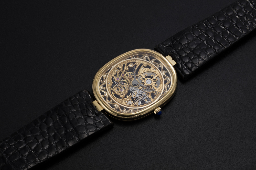 PATEK PHILIPPE, A GOLD ULTRA THIN MANUAL-WINDING SKELETON ELLIPSE WRISTWATCH, REF. 3880 - CASE