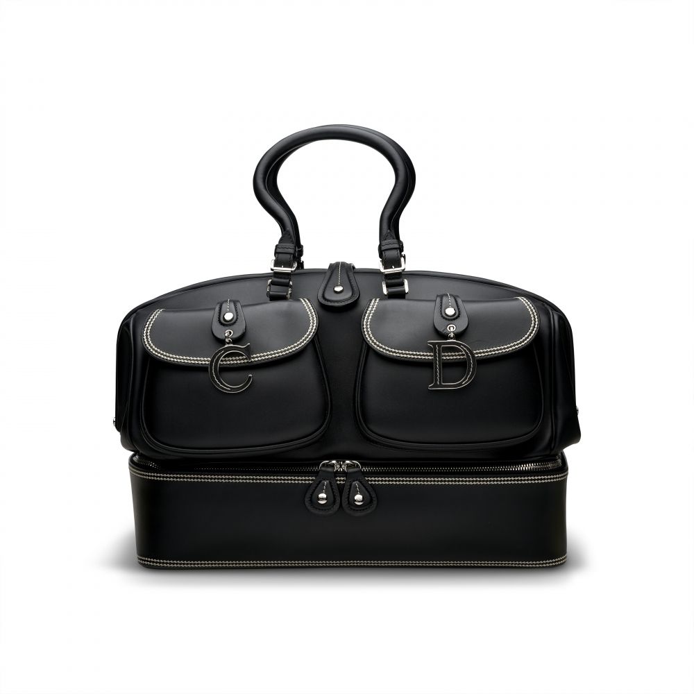 A BLACK CALFSKIN LEATHER VOYAGE BAG WITH SILVER HARDWARE BY JOHN GALLIANO - DIOR