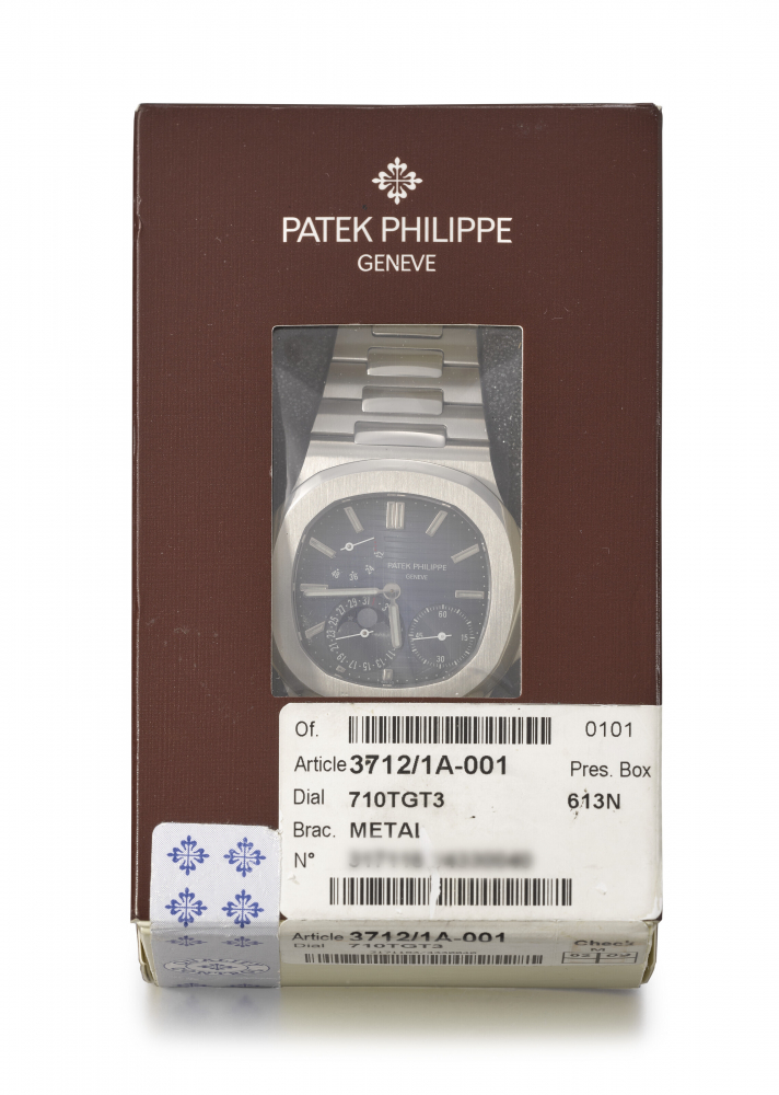 PATEK PHILIPPE. A VERY RARE STAINLESS STEEL AUTOMATIC WRISTWATCH WITH POWER RESERVE, MOON PHASES, DATE, BRACELET, CERTIFICATE OF ORIGIN AND BOX