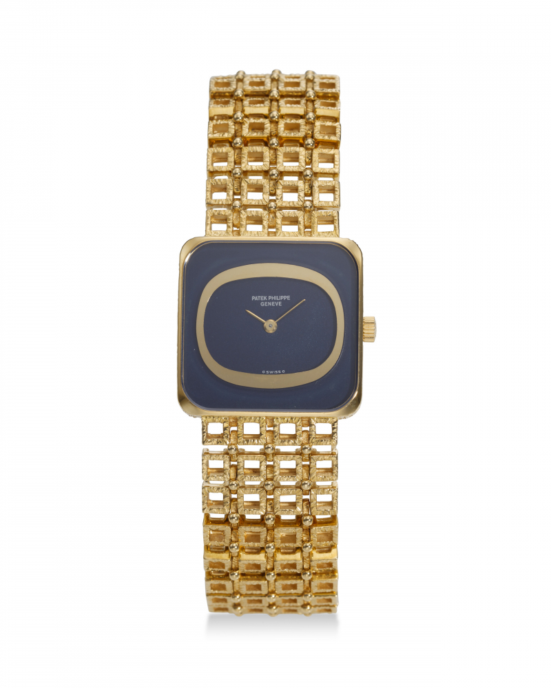 PATEK PHILIPPE, REF. 4183/1J-200, A FINE 18K YELLOW GOLD BRACELET WATCH WITH BLUE DIAL -