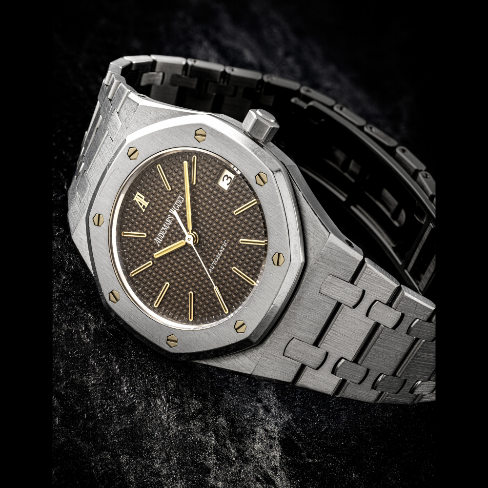 AUDEMARS PIGUET. AN ATTRACTIVE STAINLESS STEEL AUTOMATIC WRISTWATCH WITH SWEEP CENTRE SECONDS DATE BRACELET AND TROPICAL DIAL
