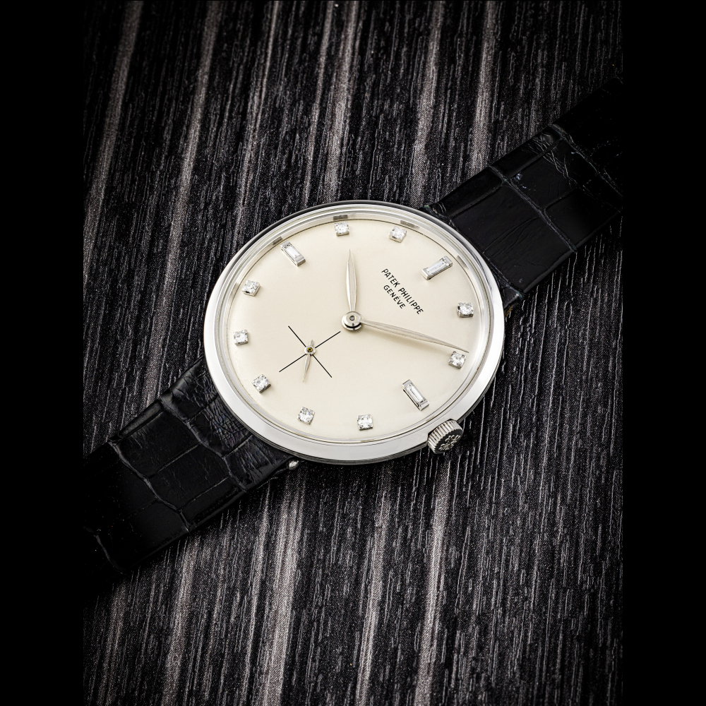 PATEK PHILIPPE. A VERY RARE PLATINUM AND DIAMOND-SET WRISTWATCH