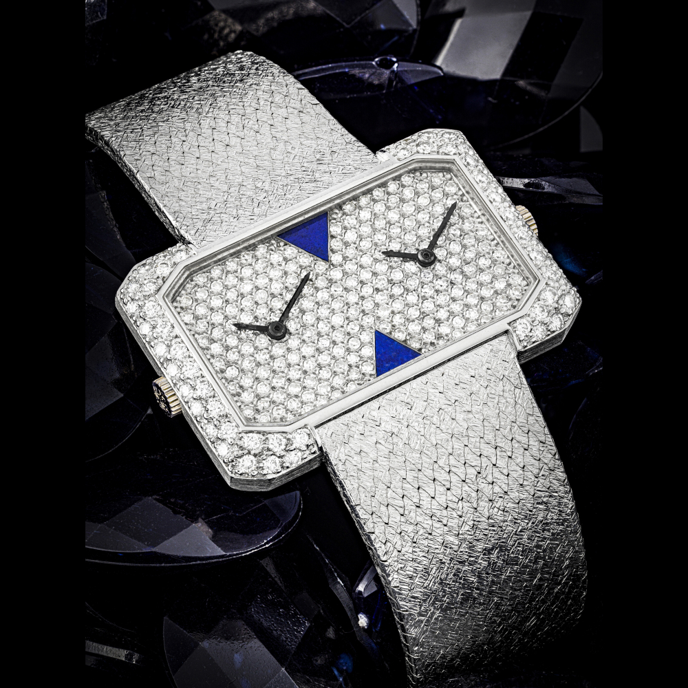 PATEK PHILIPPE. A VERY RARE 18K WHITE GOLD, DIAMOND AND LAPIS LAZULI-SET DUAL TIME BRACELET WATCH