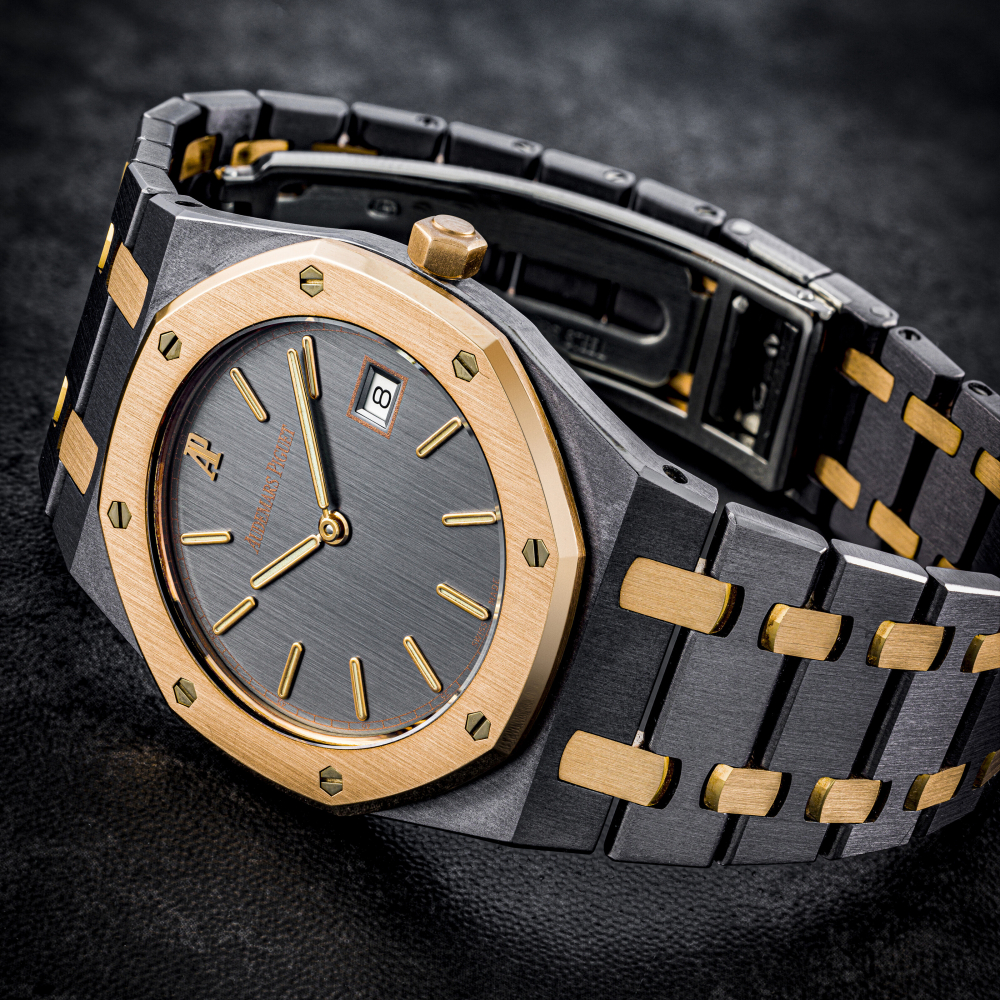 AUDEMARS PIGUET. A TANTALUM AND 18K PINK GOLD WRISTWATCH WITH DATE AND BRACELET